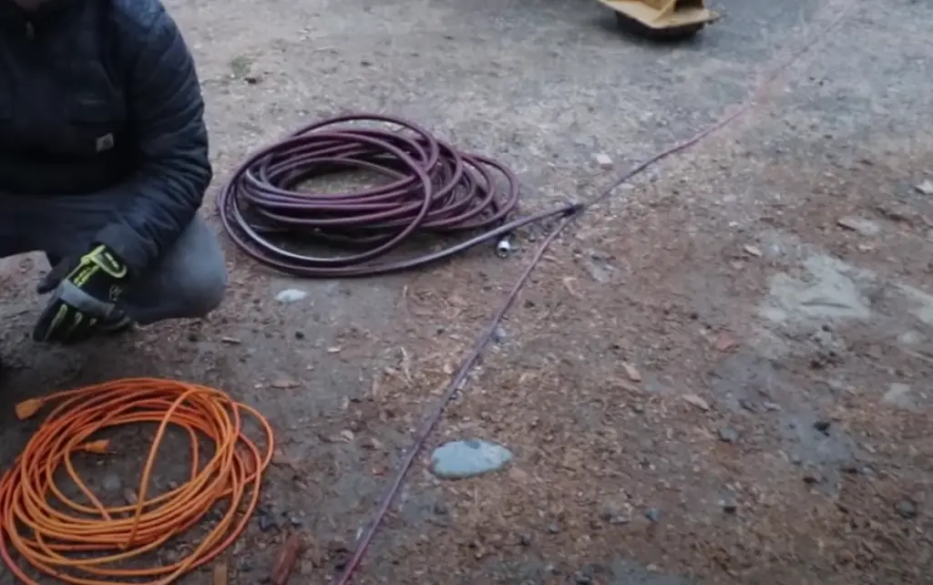 Here are five simple steps for coiling a garden hose: