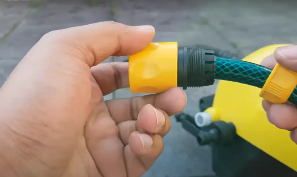 Connect garden hose with a pressure washer