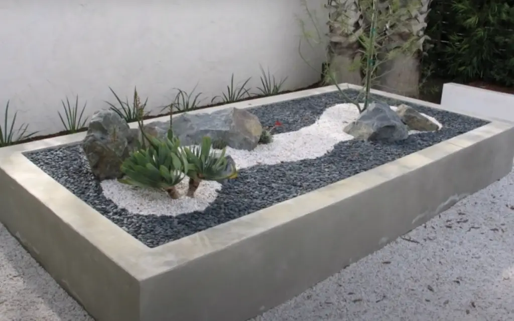 How do you arrange rocks in a rock garden?