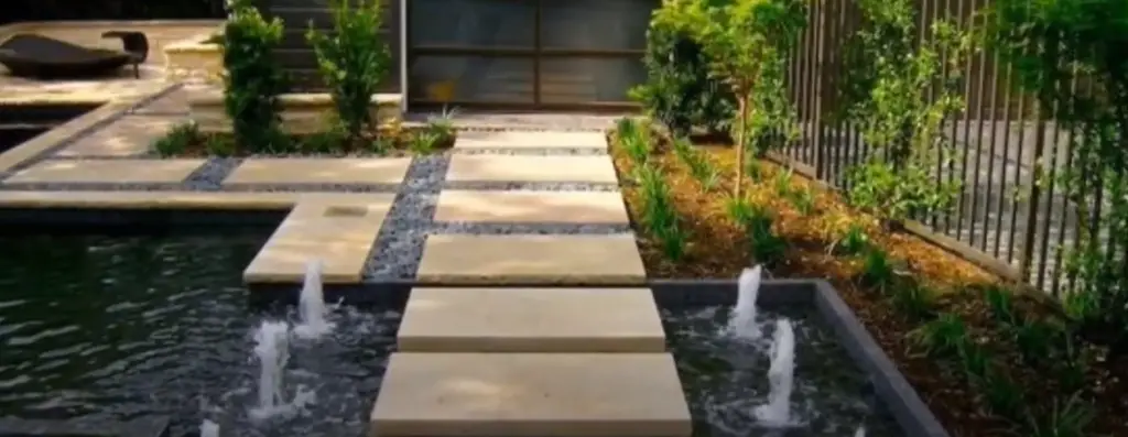 Integrate your water feature into a raised bed
