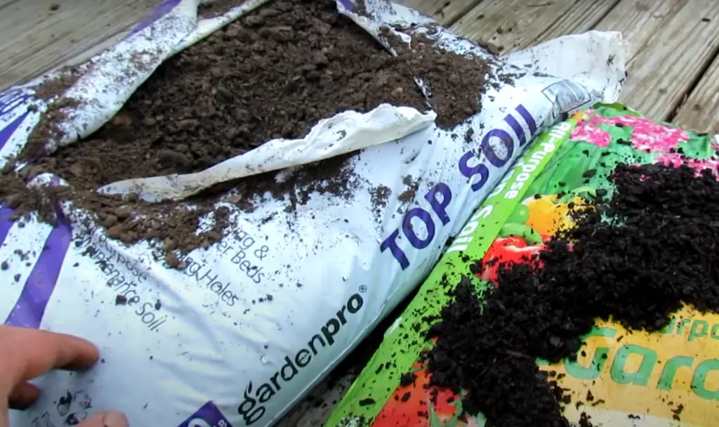 What should be added to Miracle Gro garden soil?