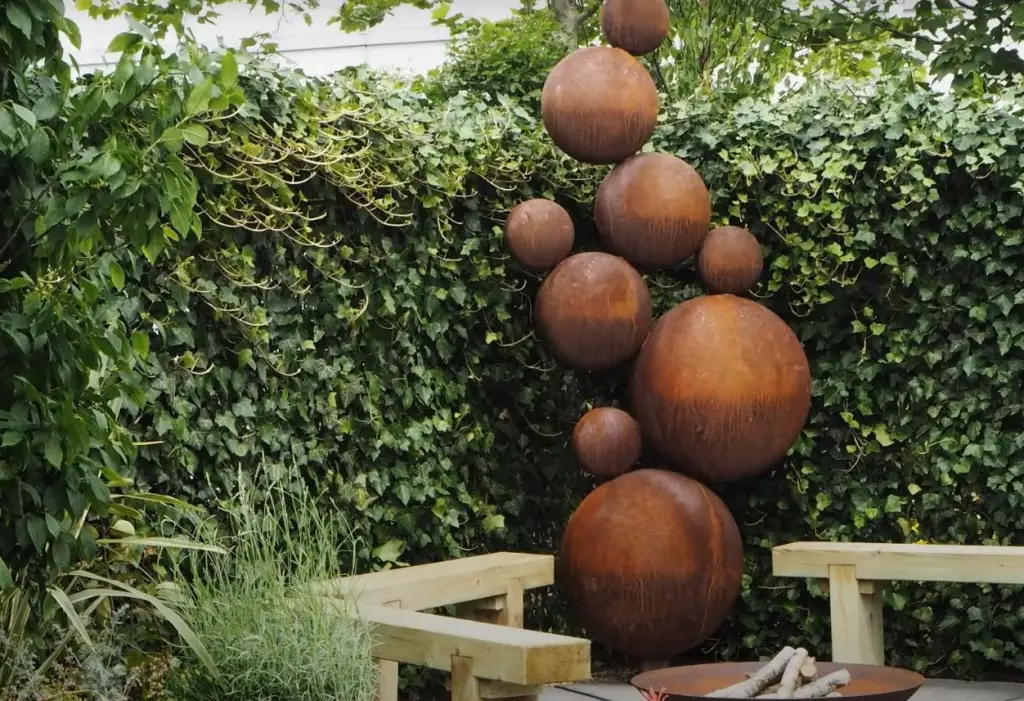 What is the best way to showcase garden sculptures?